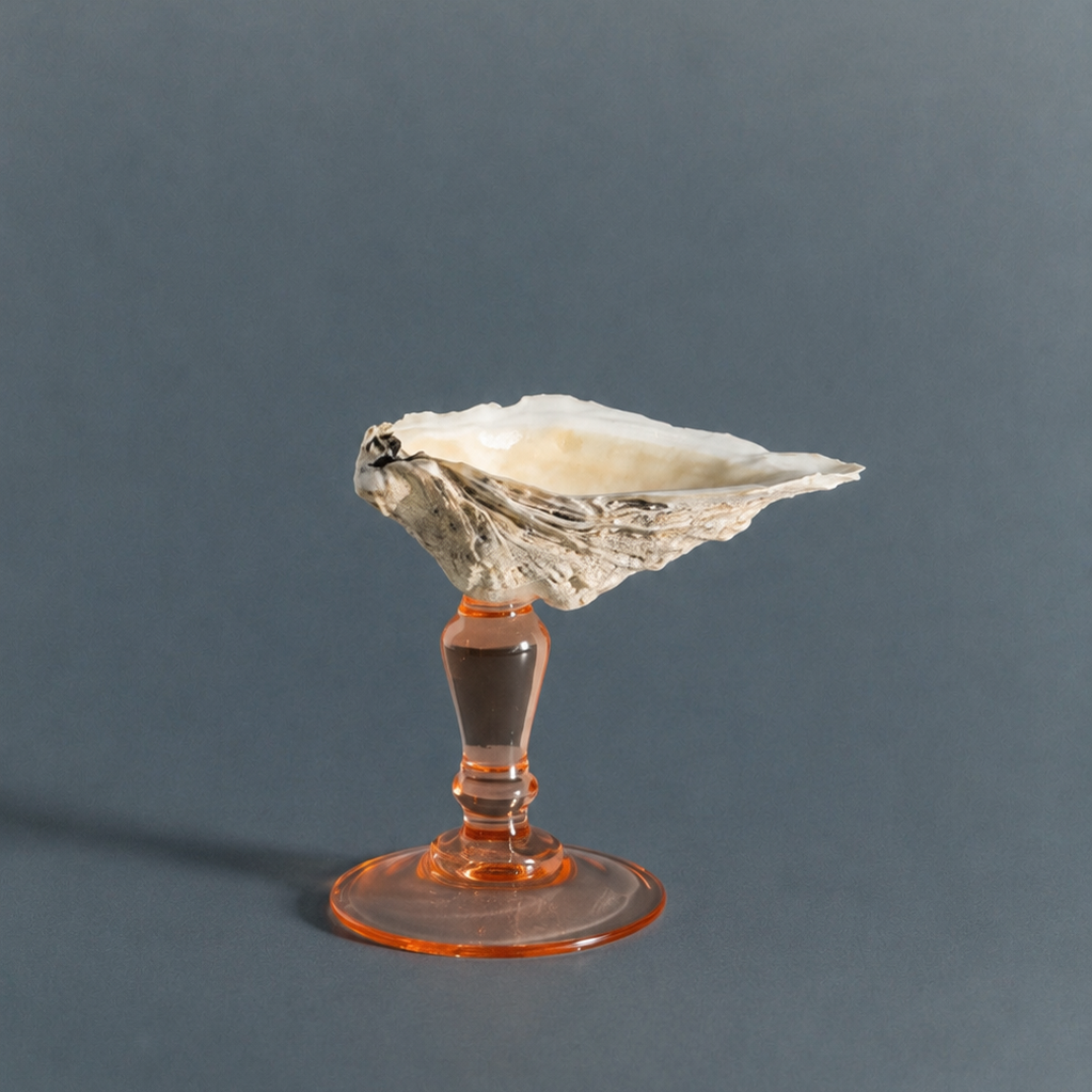 Oyster shell dish on peach glass stem, made in France, full view